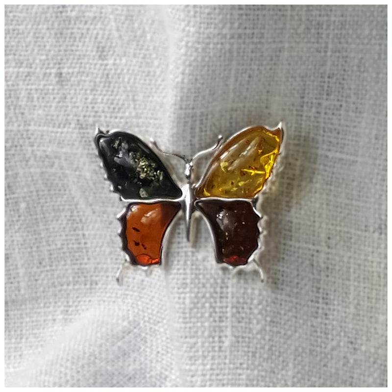 Silver brooch Bow tie four-colored amber